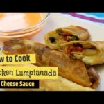 Chicken Lumpianada with Cheese Sauce